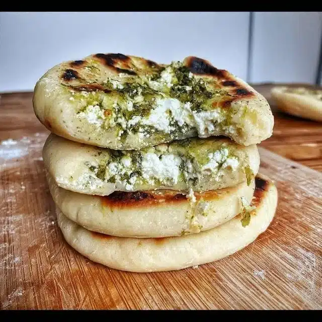 Delicious Feta Flatbreads topped with fresh herbs and vegetables
