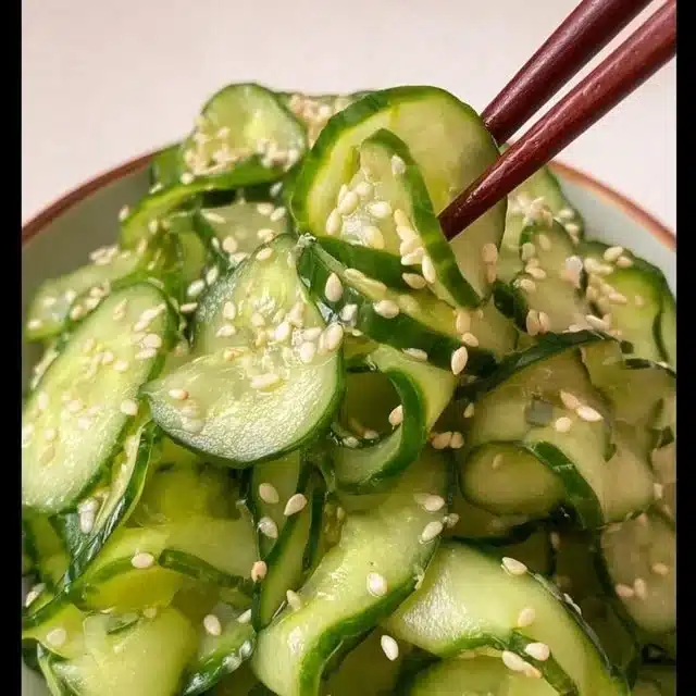 Japanese Cucumber Salad (Sunomono) served in a bowl with sesame seeds